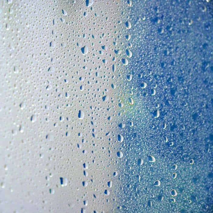 Close up of water drops on glass surface