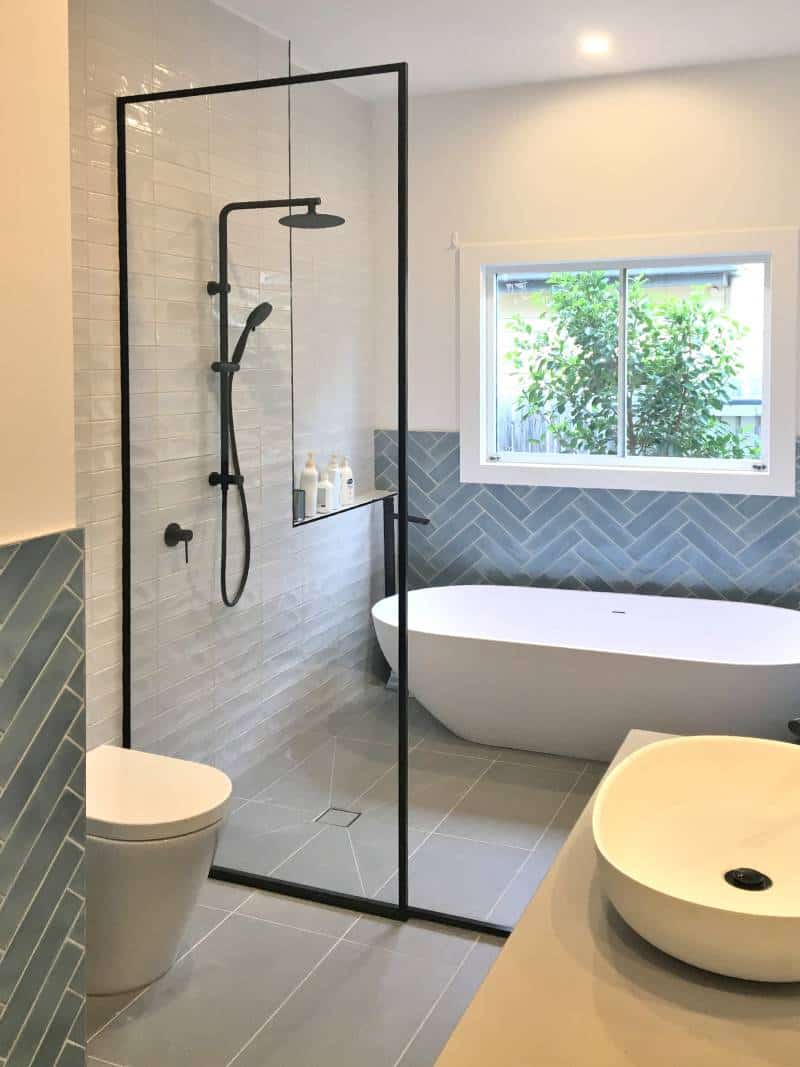 Low iron glass in a black frame for a walk in shower