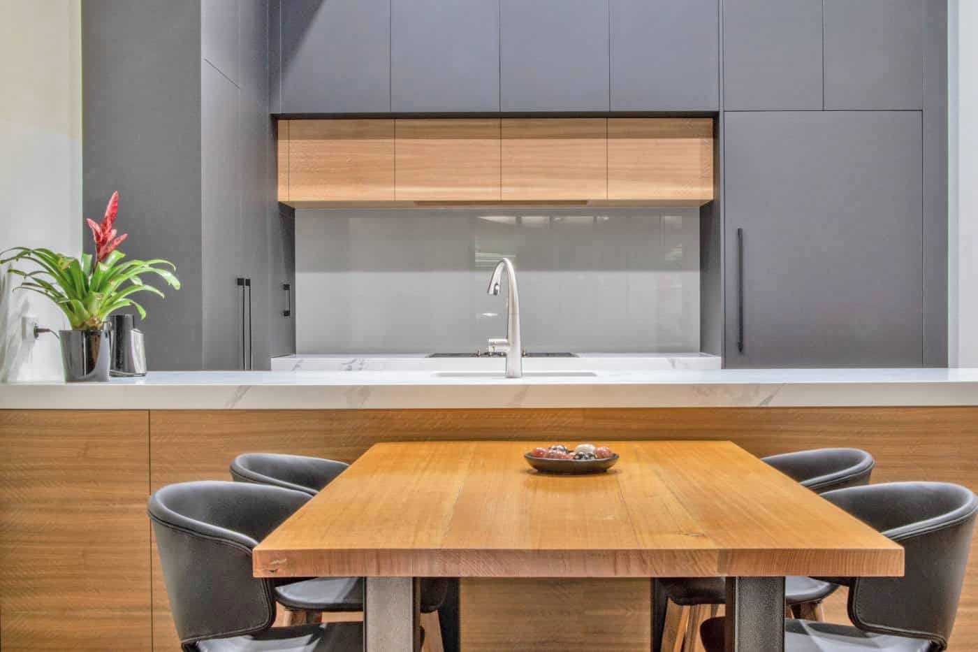 aqua-glass-splashback-off-white-kitchen Grey glass splashback in a modern grey Melbourne kitchen