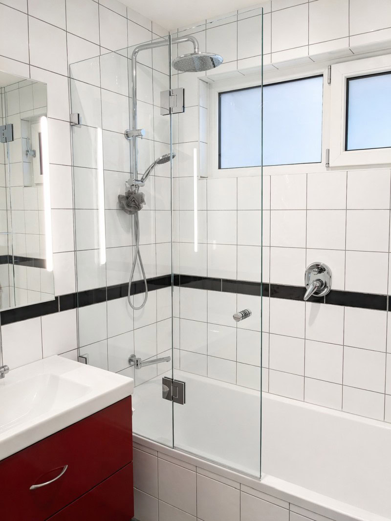 Over bath shower screen installed in Greensborough bathroom
