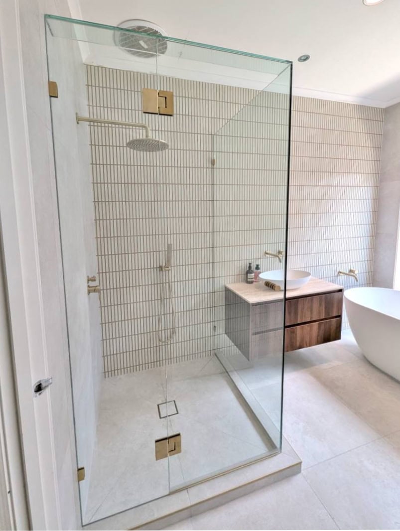 Standard clear frameless shower screen in bathroom