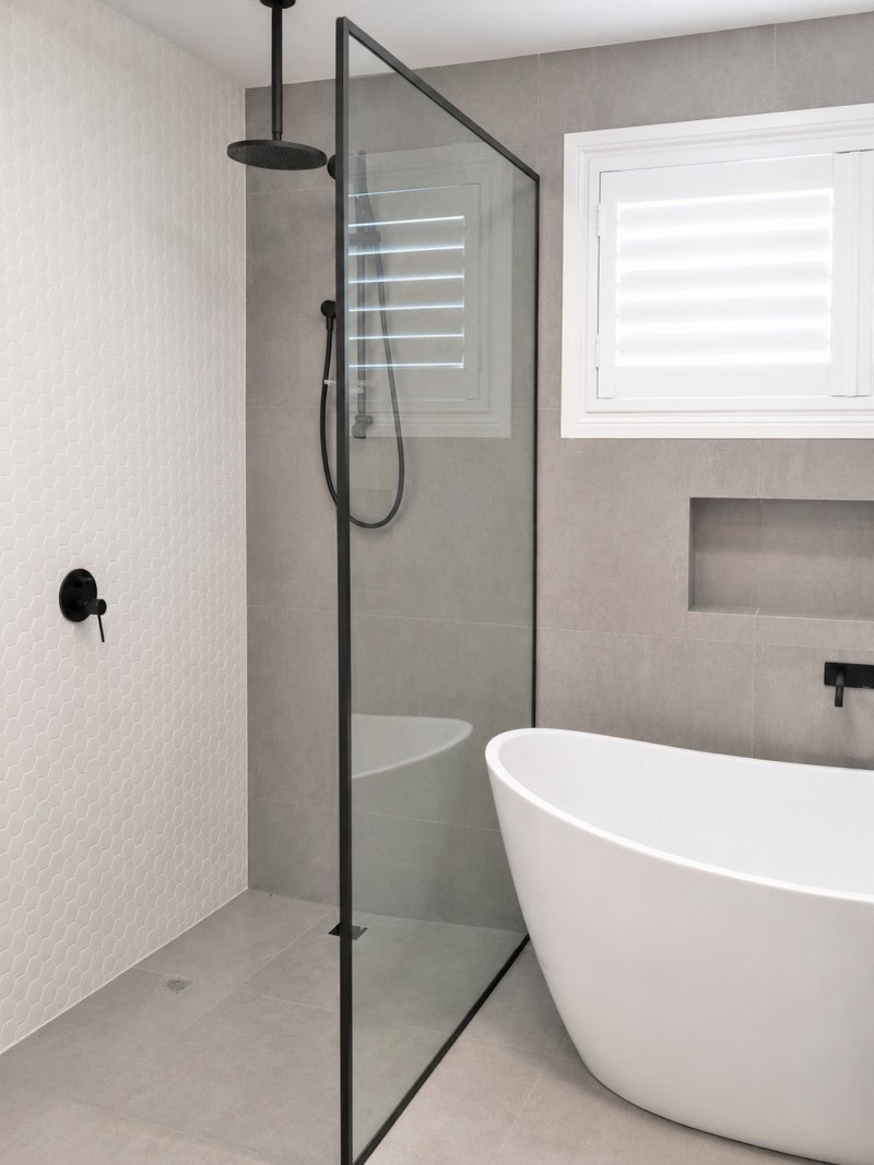 Black frame shower screen installed in Altona bathroom renovation