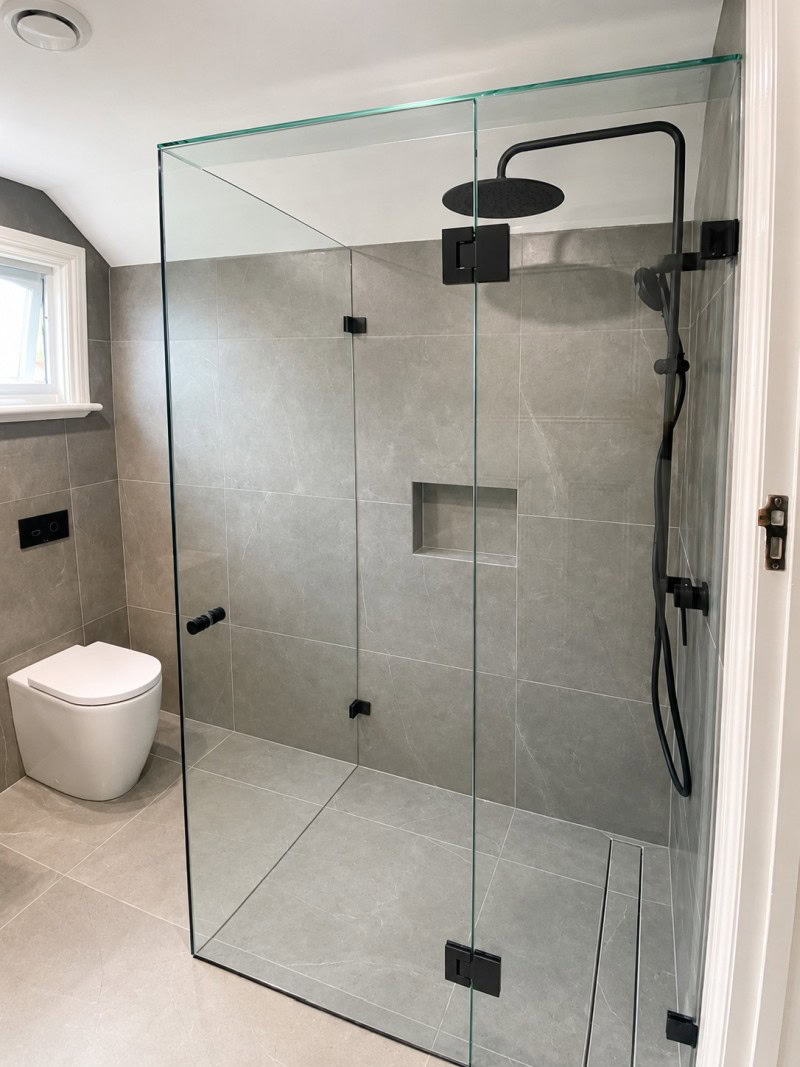 Standard clear glass shower screen with matt black hardware