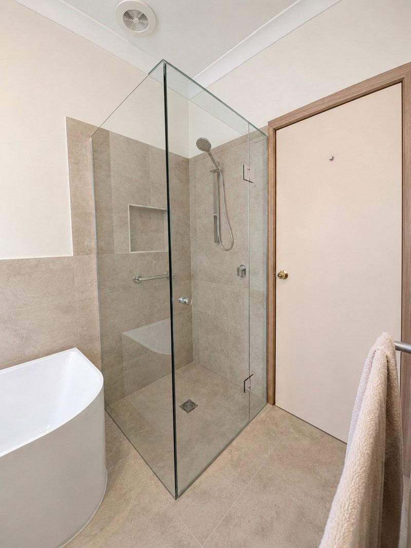 Chrome frameless shower screen installed in St Helena bathroom renovation