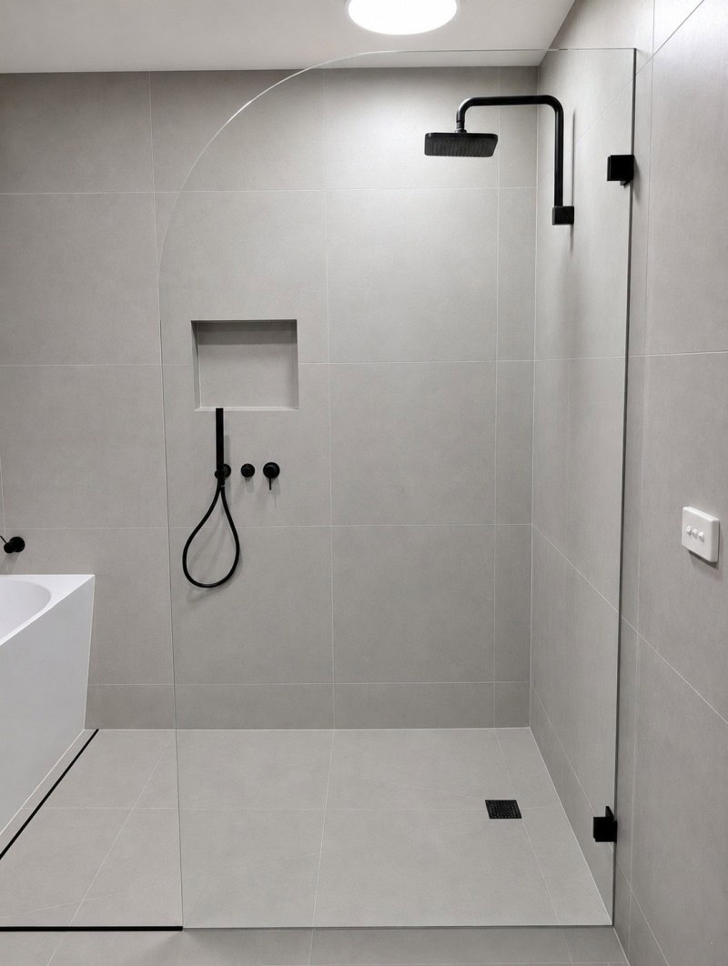 Curved glass shower screen with large radius corner installed in Taylors Lakes bathroom