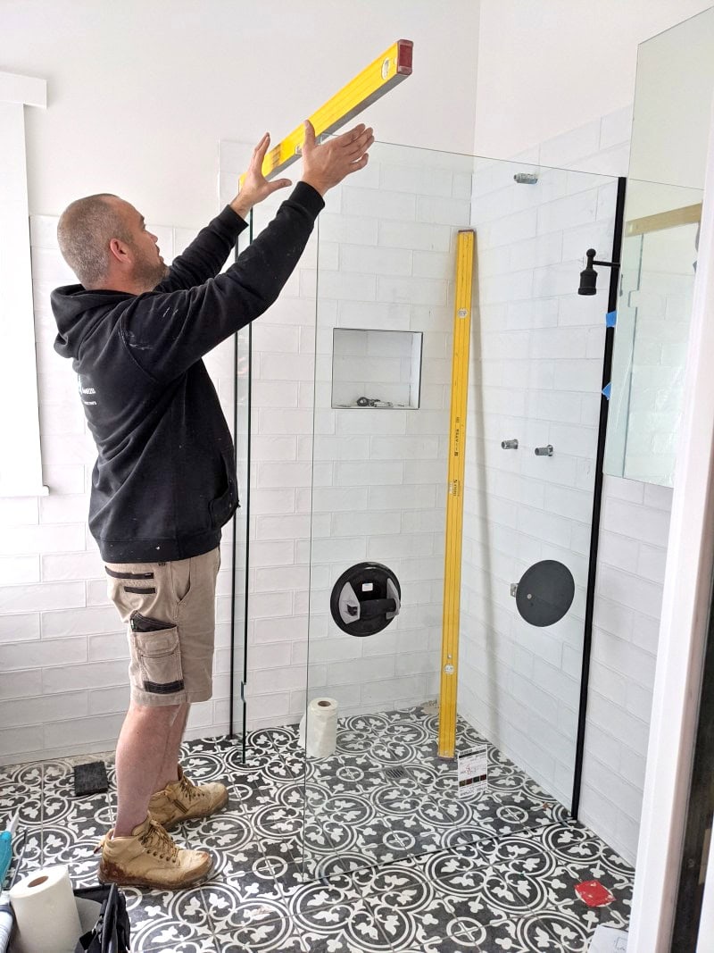 Installation of a frameless shower screen in Coburg