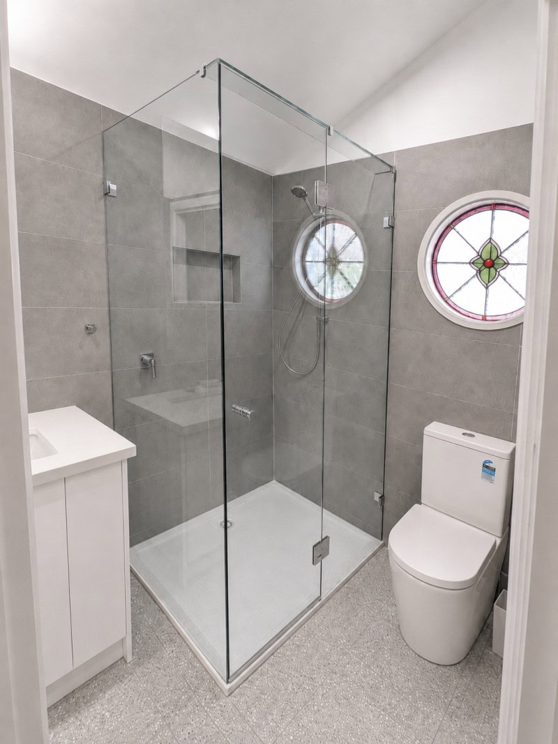 Frameless shower screen installed in Essendon bathroom renovation