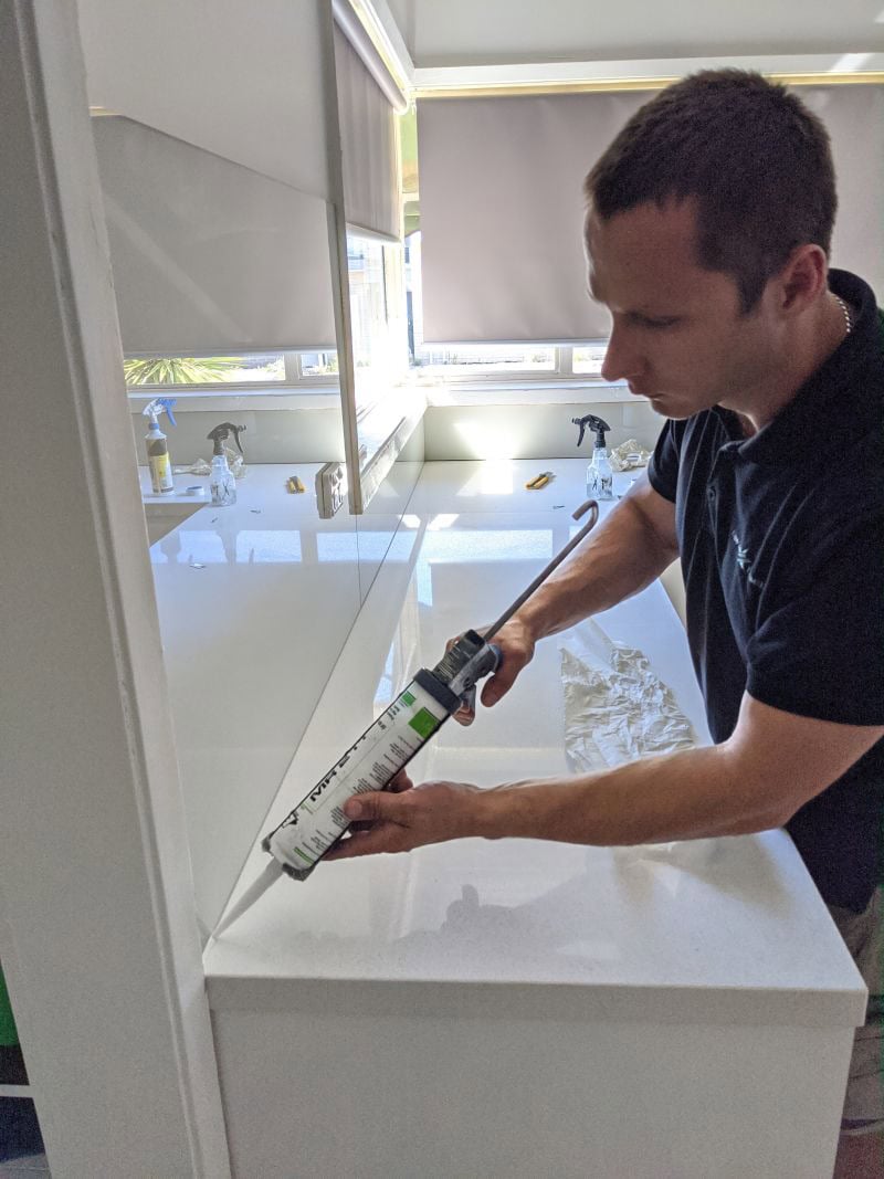 Custom glass splashback installation in a Melbourne kitchen