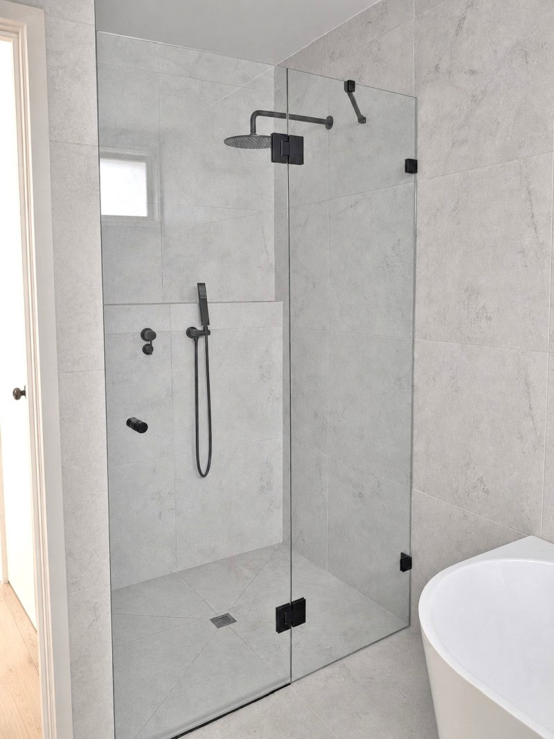 Inline frameless shower screen installed in Keilor Downs bathroom renovation