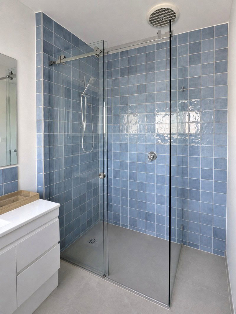 Sliding frameless shower screen installed in Altona North bathroom