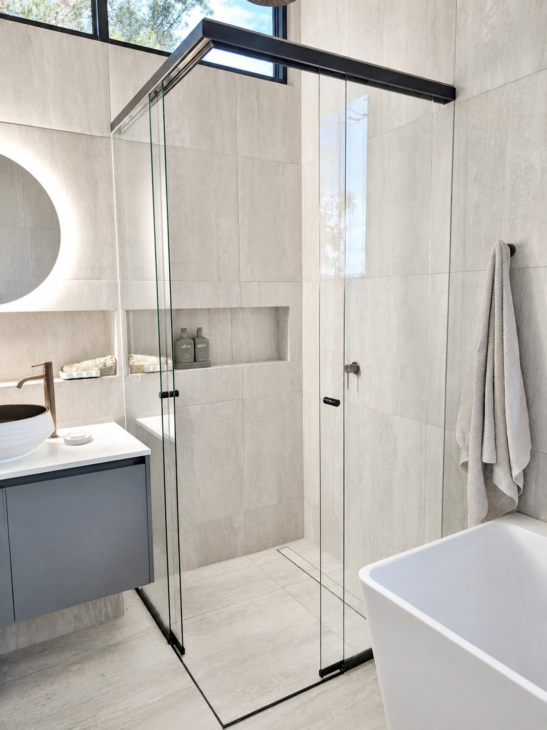 Black corner entry sliding shower screen installed in Eltham