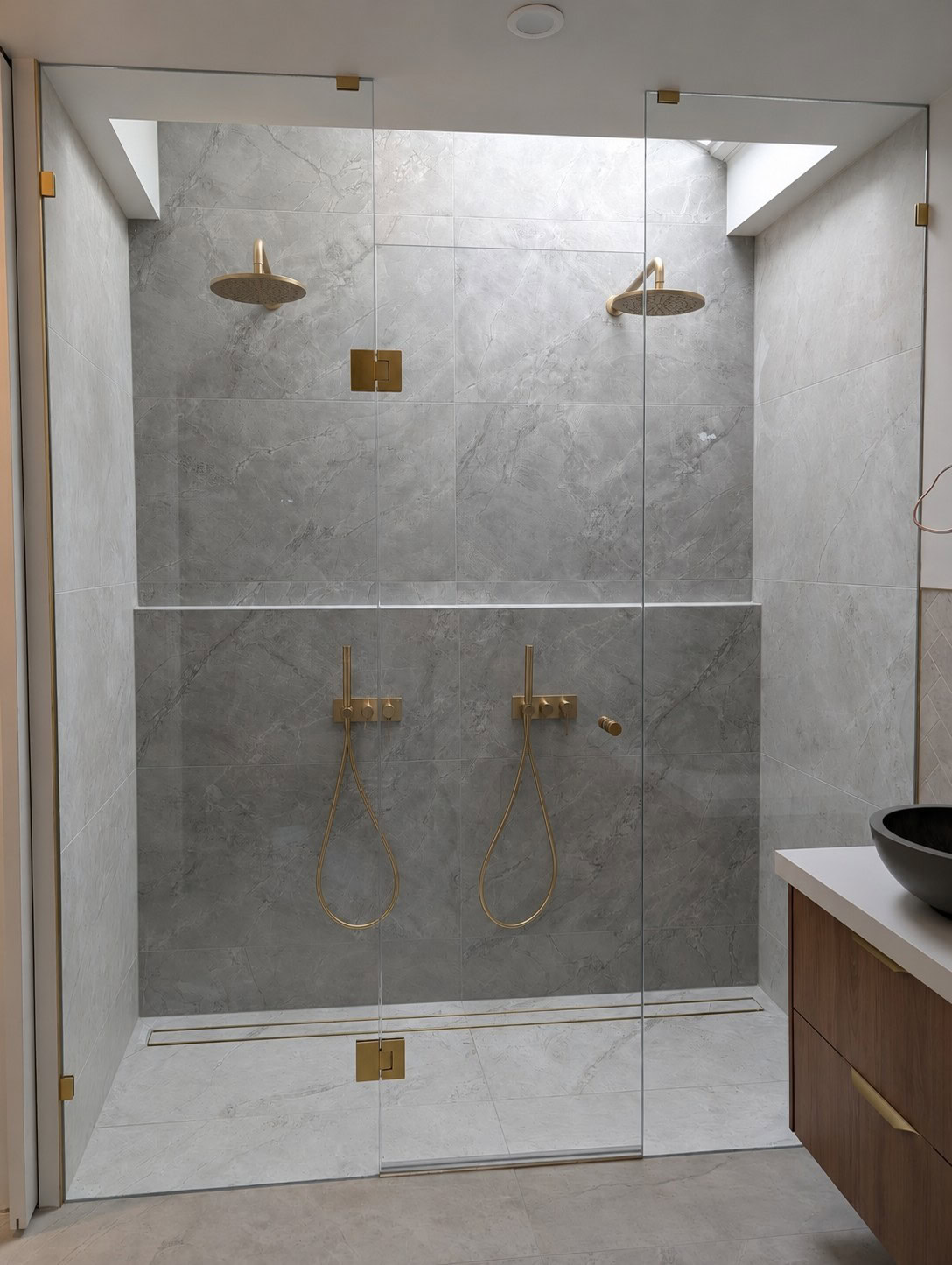 Full height frameless shower screen installed in Taylors Lakes bathroom