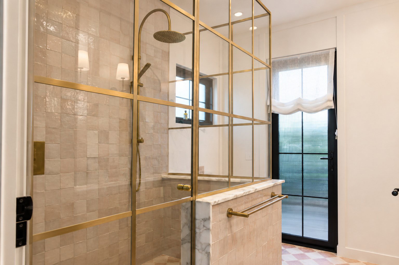 Full view of the raw brass framed front ensuite shower enclosure
