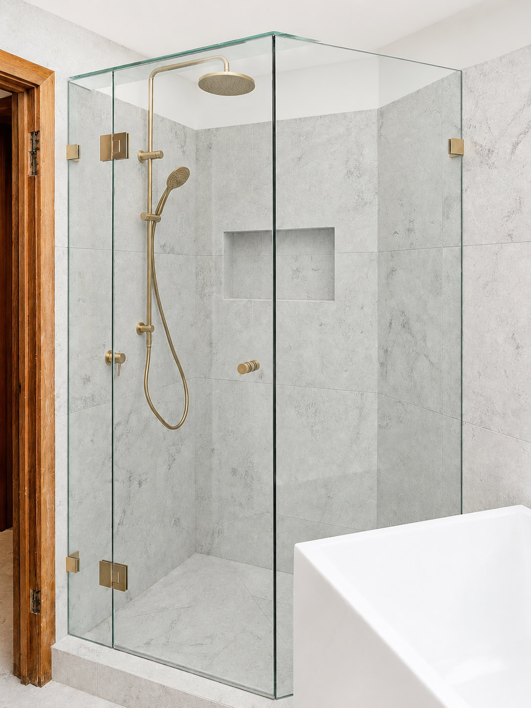 Brushed gold frameless shower screen installed in Keilor Downs bathroom