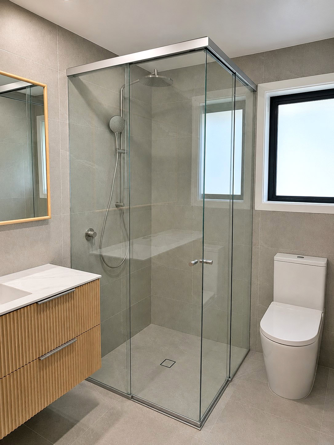 Brushed nickel corner entry shower screen