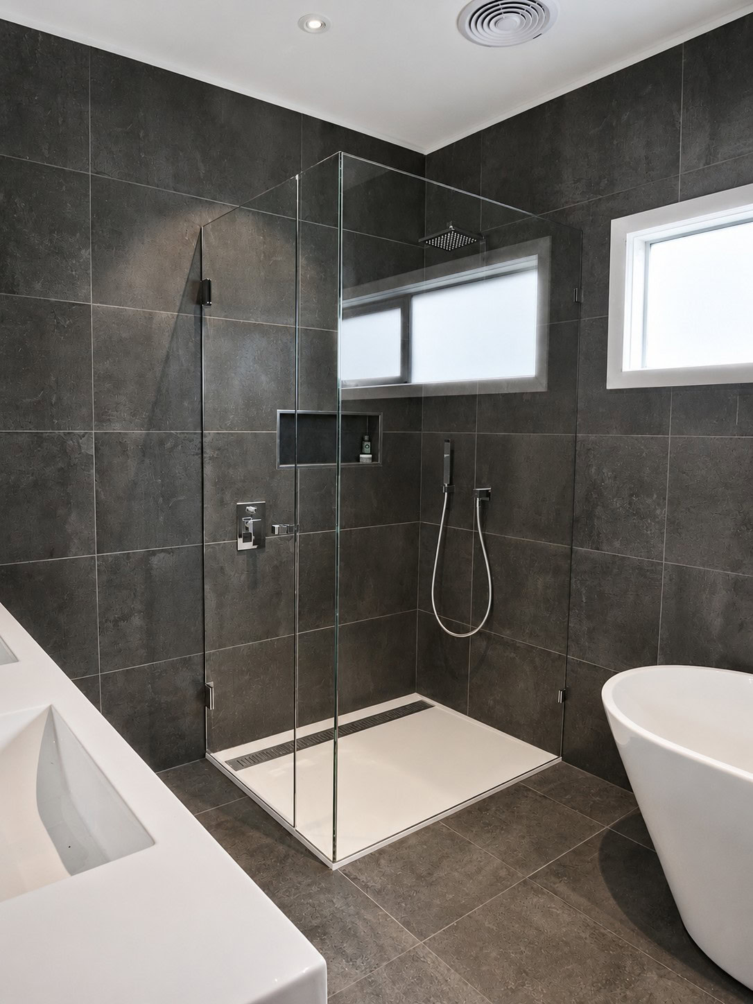 Chrome frameless shower screen installed in Lalor