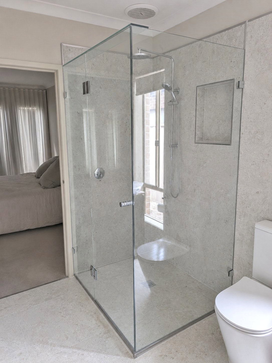 Chrome ensuite frameless shower screen installed in Point Cook bathroom