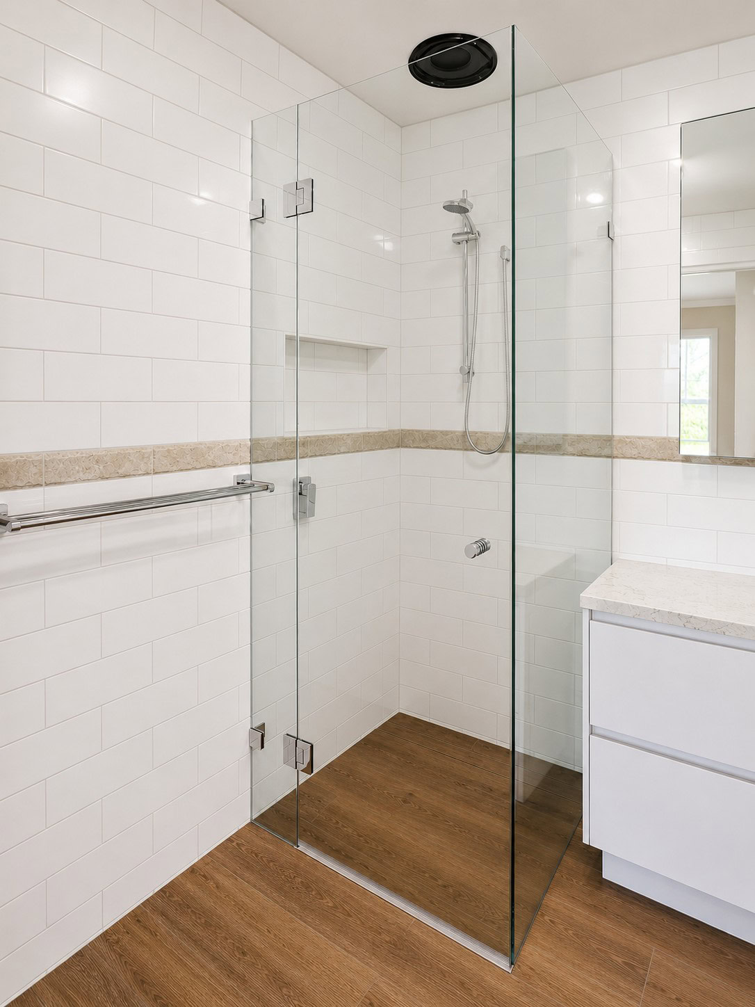Chrome frameless shower screen installed in Eltham bathroom