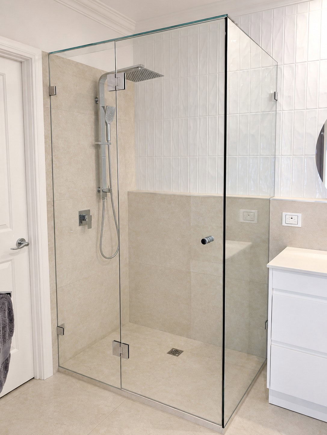 Chrome frameless shower screen enclosure installed in Sunbury bathroom