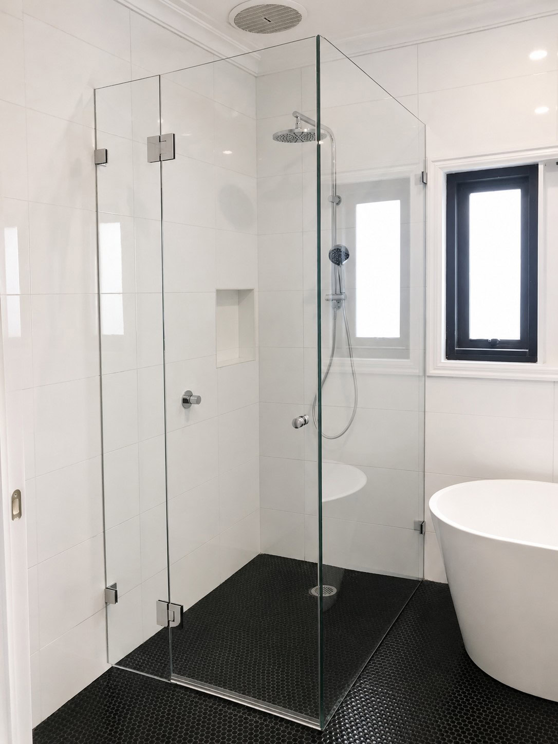 Chrome Starphire glass shower screen installed in Sunshine West