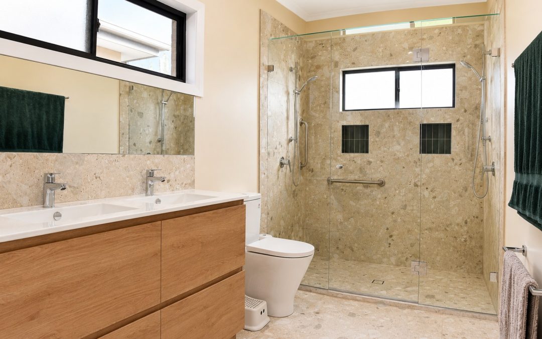 Chrome wall to wall frameless shower screen installed in a renovated West Footscray bathroom