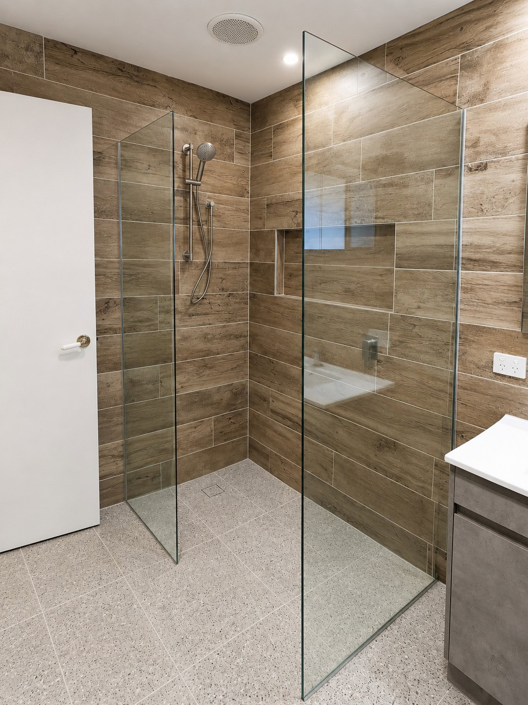 Clear glass walk-in shower screen installed in Ballan bathroom
