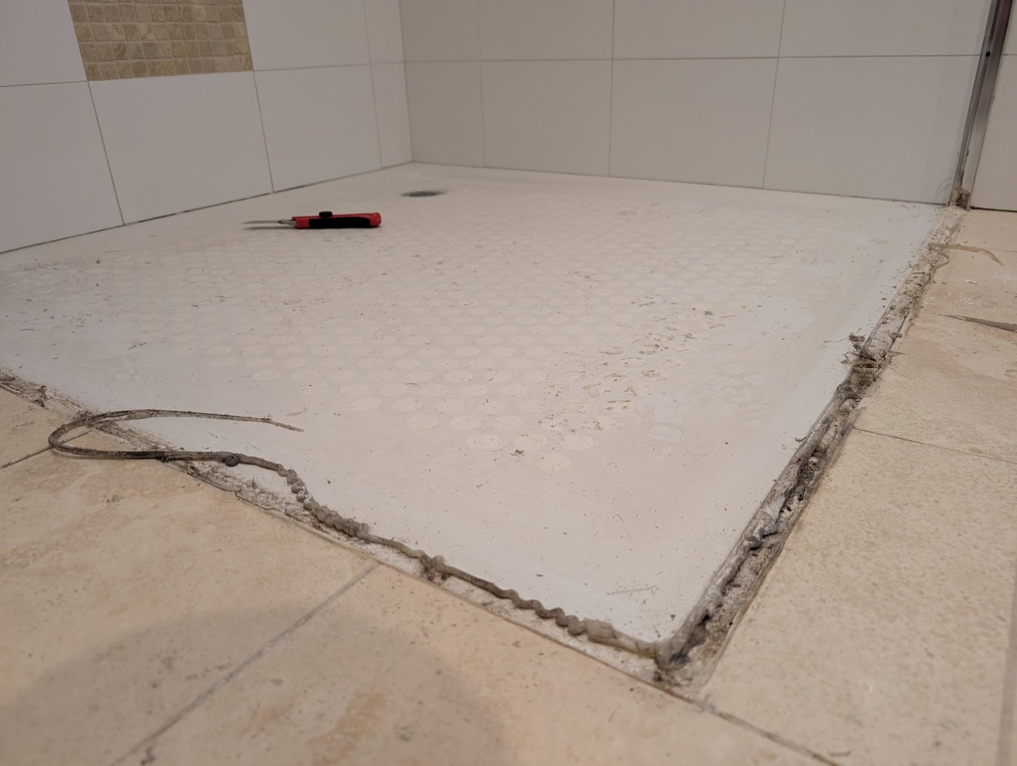Bathroom floor repair during shower screen replacement in Avondale Heights