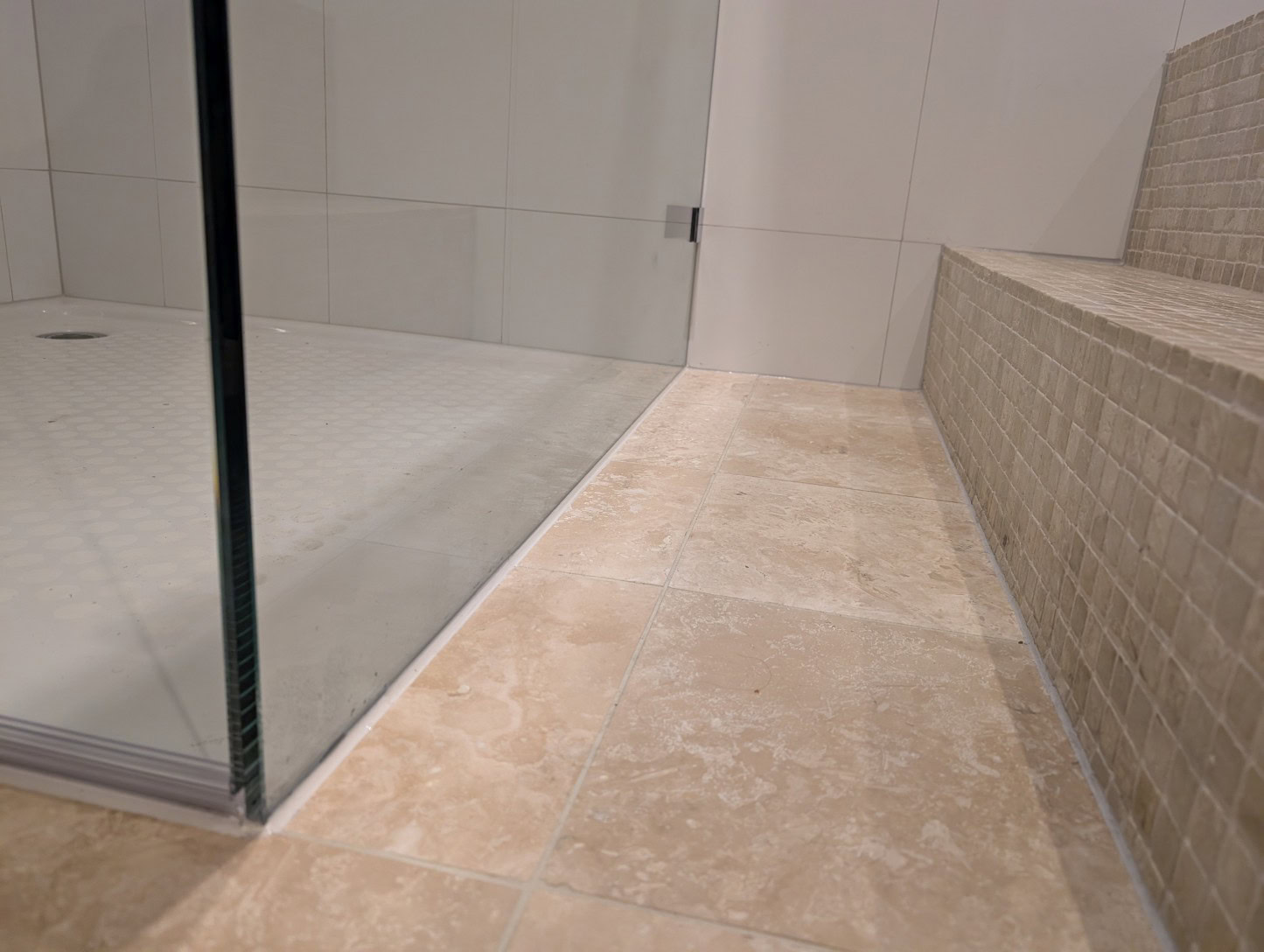 Re tiled shower floor before new frameless shower screen installation in Avondale Heights