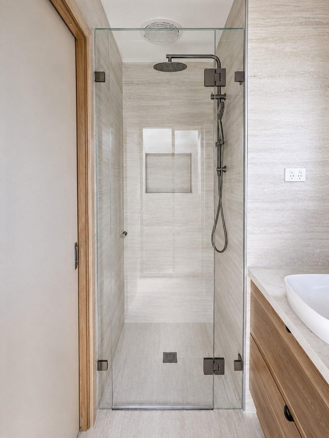 Gunmetal ensuite frameless shower screen installed in Epping