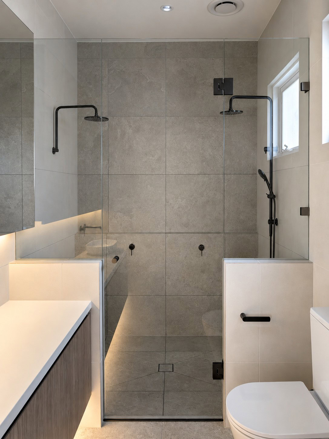 Gunmetal ensuite frameless shower screen installed in Ascot Vale