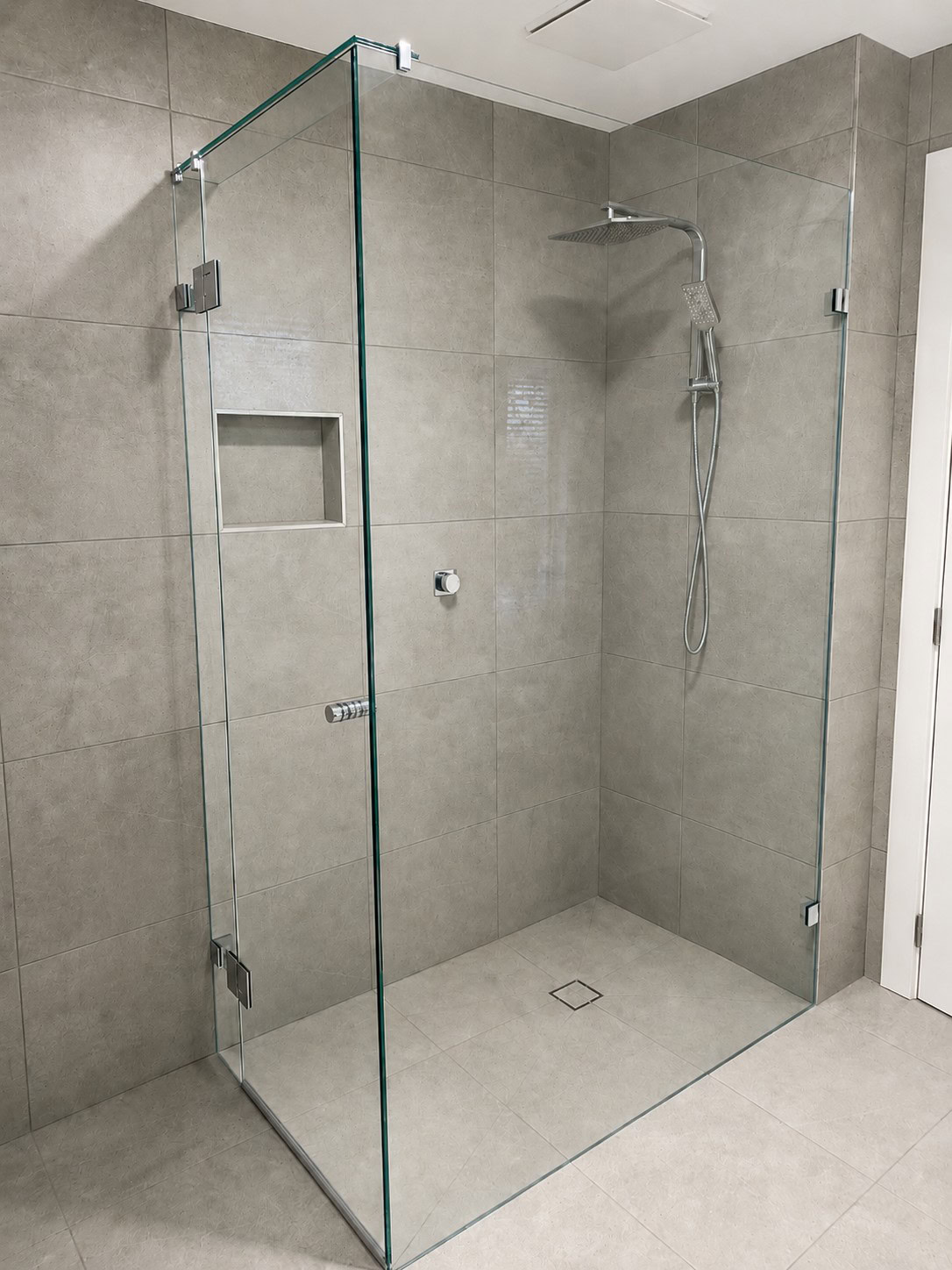 Large frameless shower screen installed in Eltham