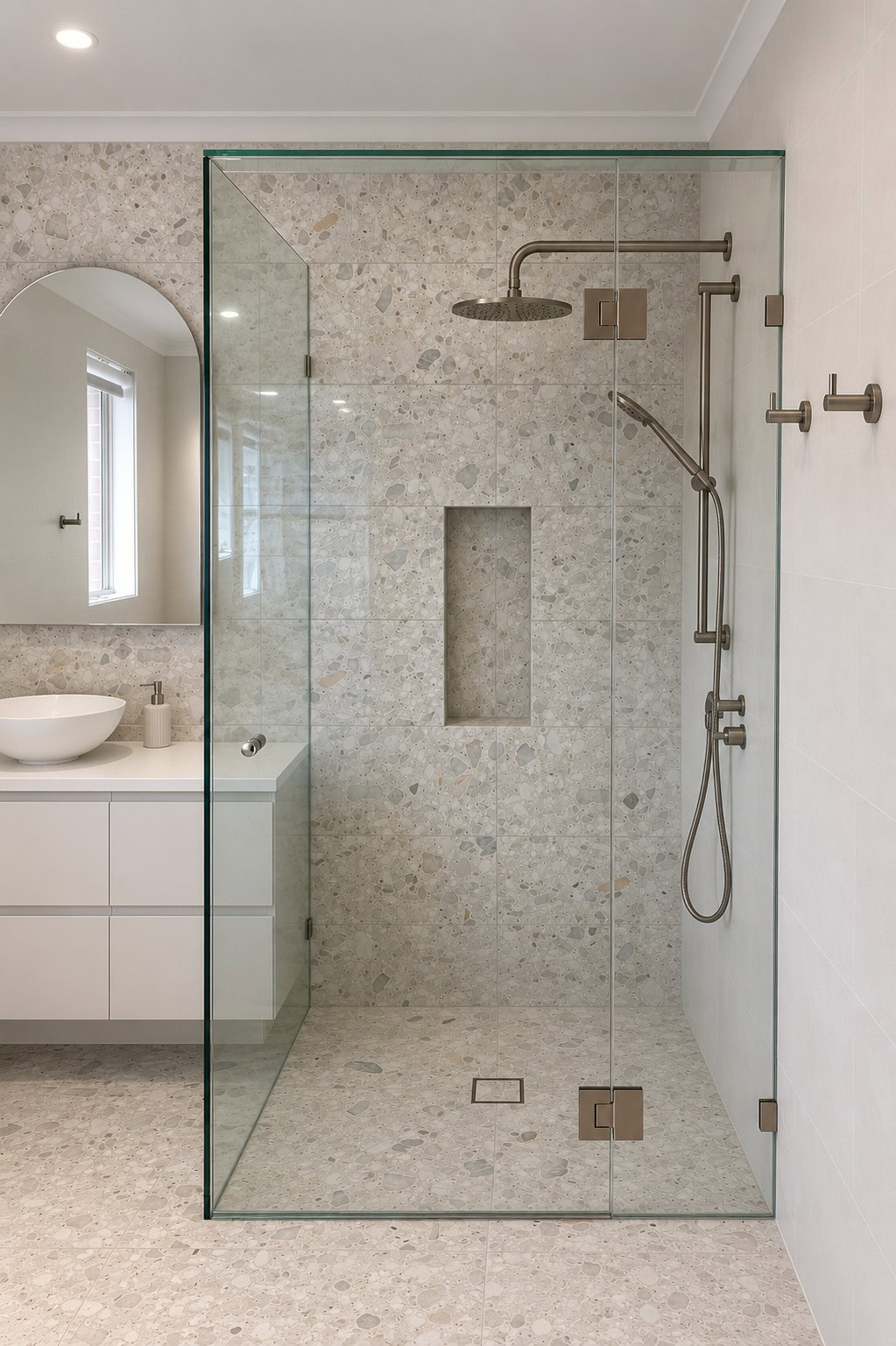 Meir champagne frameless shower screen with clear glass installed in Bacchus Marsh