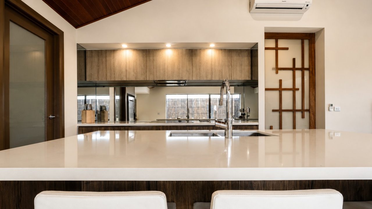 Mirror glass splashback installed in a Melbourne kitchen