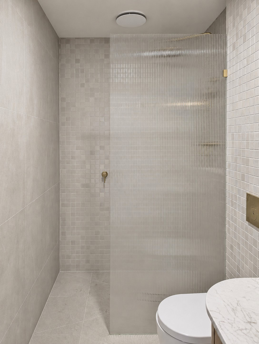 Reeded glass walk-in shower screen installed in Bacchus Marsh bathroom