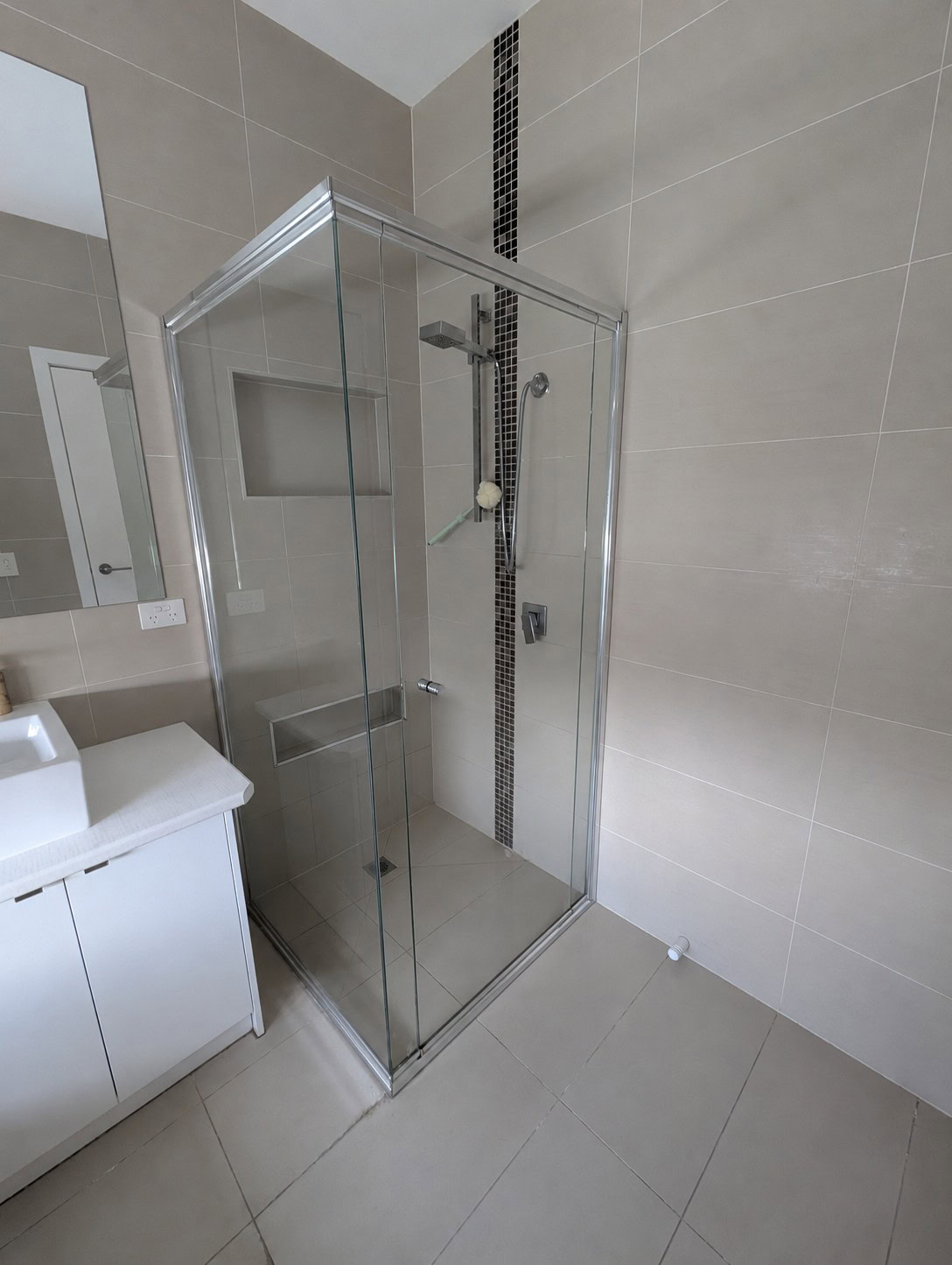 Old framed shower screen before replacement in Caroline Springs bathroom