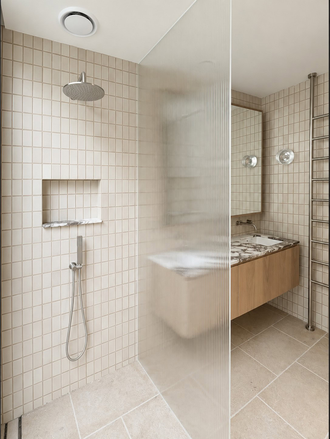 Floor to ceiling fluted glass shower screen installed in Fitzroy