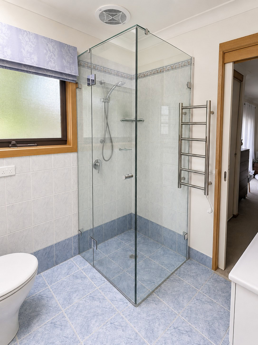 Chrome frameless ensuite shower screen replacement installed in Eltham