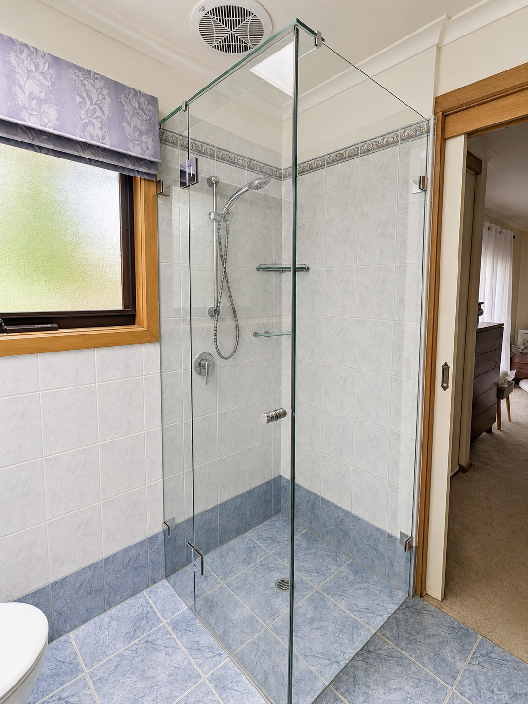 Chrome frameless ensuite shower screen replacement installed in Eltham