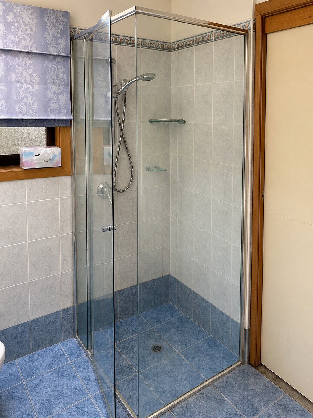 Old shower screen removed from Eltham ensuite before replacement