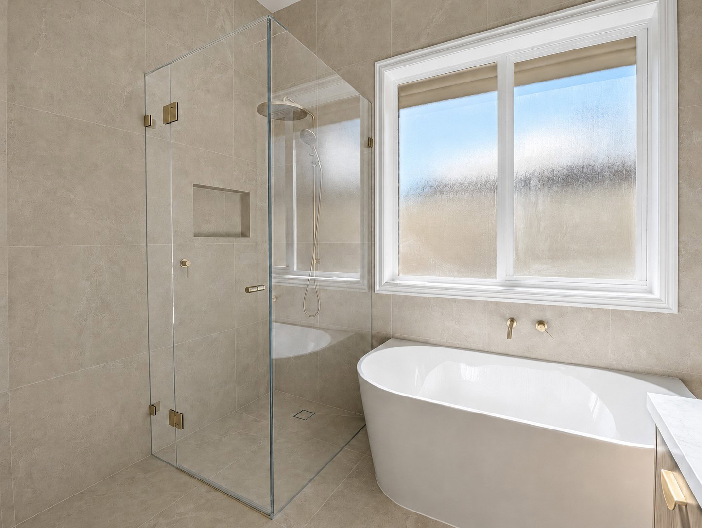 Frameless shower screen installed in a Caroline Springs bathroom