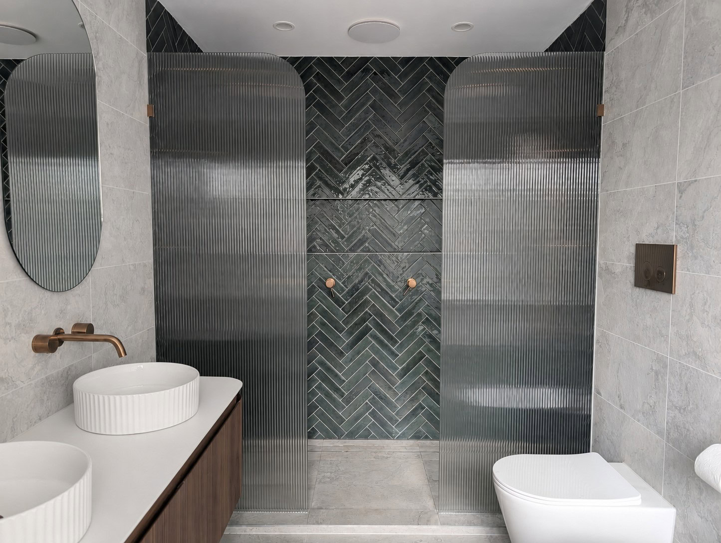 Narrow reeded walk in double shower screen installed in Darley bathroom